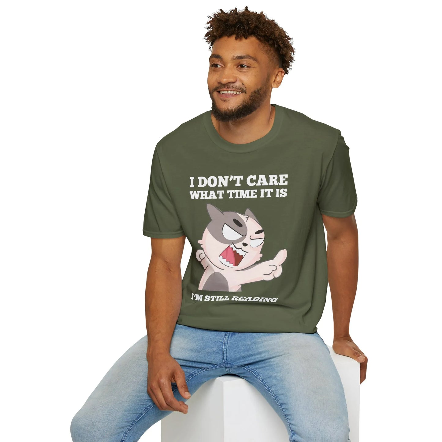 Funny cat reading shirt featuring a sassy cat with text "I DON'T CARE WHAT TIME IT IS, I'M STILL READING" - perfect gift for book lovers!