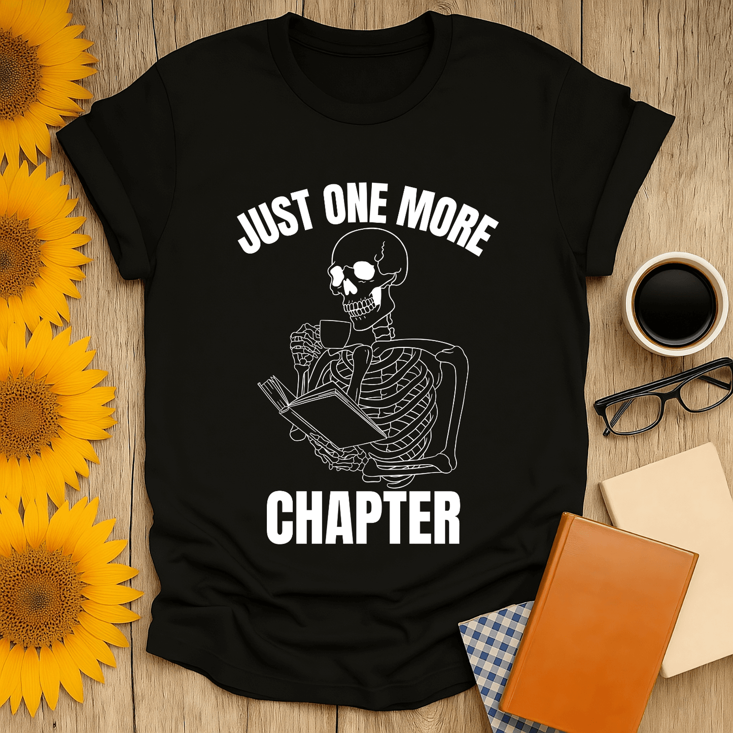 Skeleton Reader T-Shirt featuring a playful design, perfect for book lovers and readers. Unisex fit, 100% cotton, USA-made.