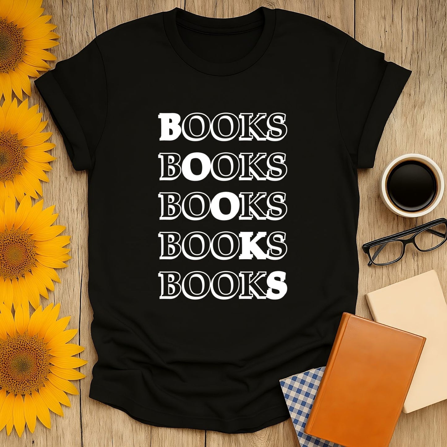 Black unisex book lover t-shirt with a bold 'BOOKS' printed design, surrounded by books and a coffee cup.