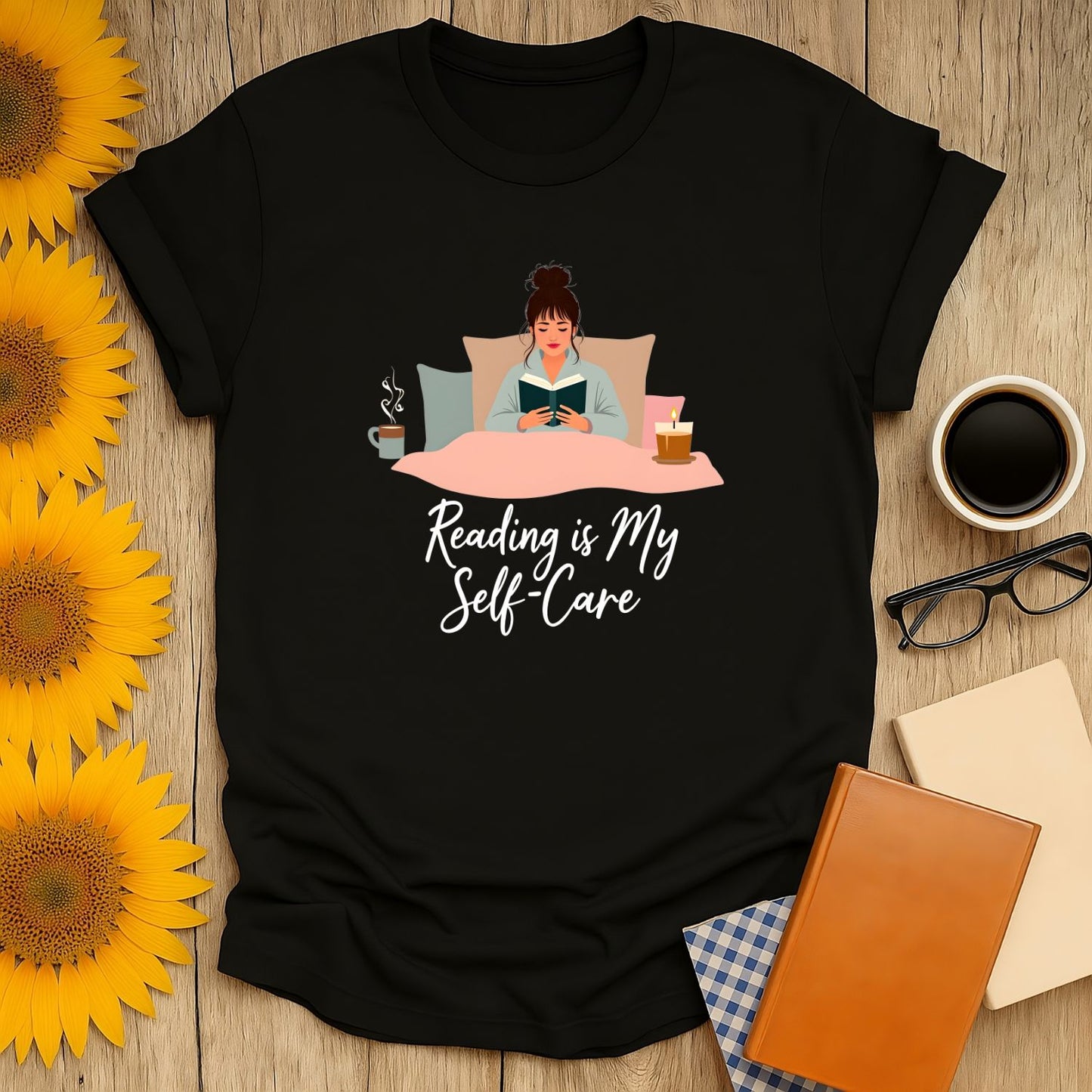 Cozy book shirt featuring a woman in bed with a book, coffee, and text "Reading is My Self-Care"—perfect for book lovers!