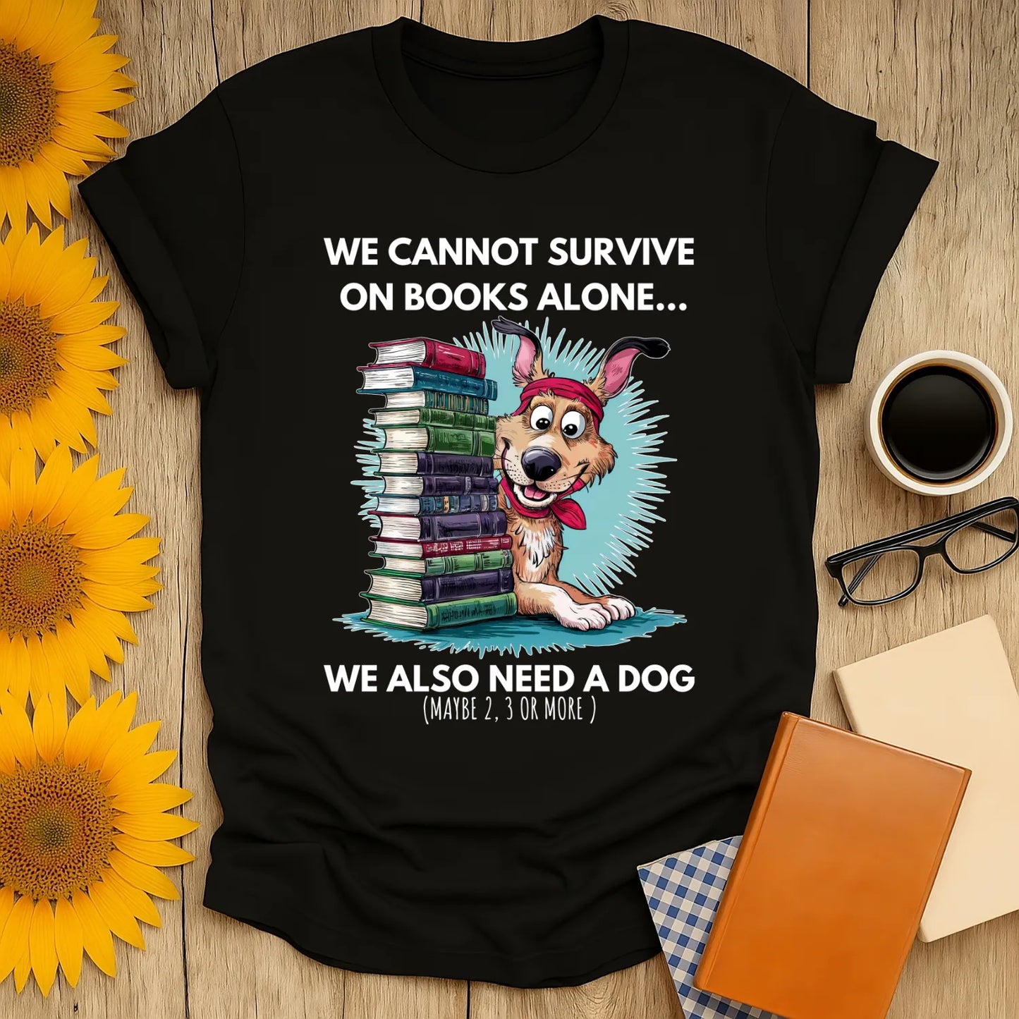 Funny book lover shirt with a cartoon dog beside stacked books, saying, 'We cannot survive on books alone... We also need a dog.'