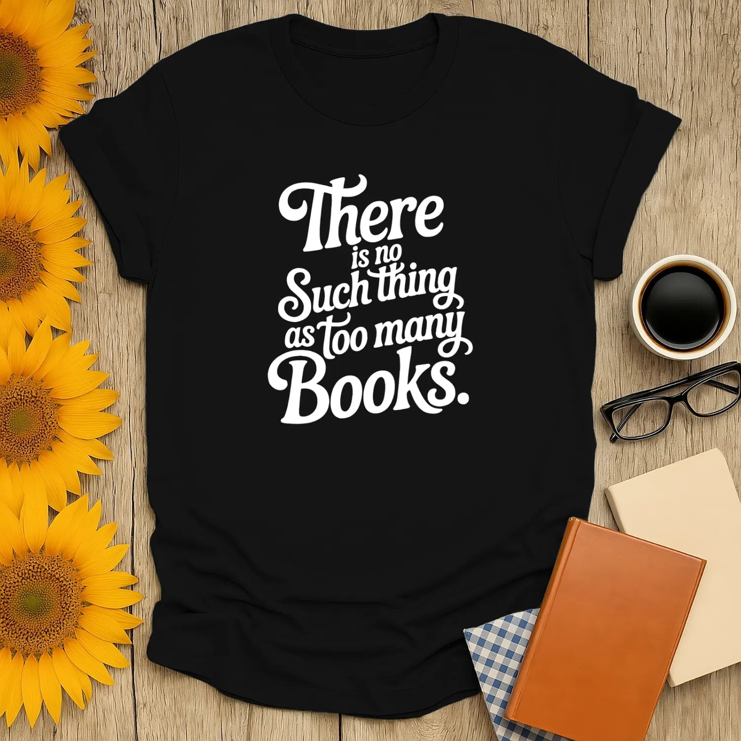 Funny reading tee with text: 'There is no such thing as too many books.' Perfect gift for book lovers, cozy and stylish.