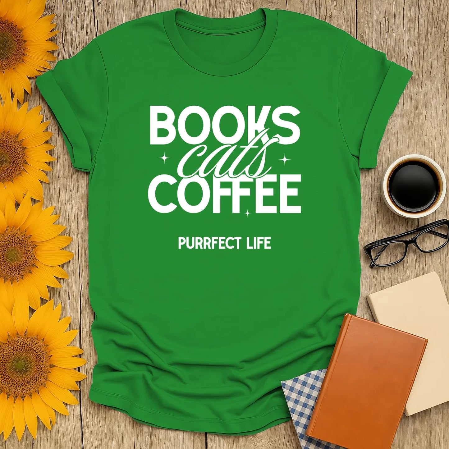 Trio of Joy T-Shirt featuring bold white text: 'BOOKS cats COFFEE PURRfect LIFE' perfect for cozy book lovers and cat enthusiasts.