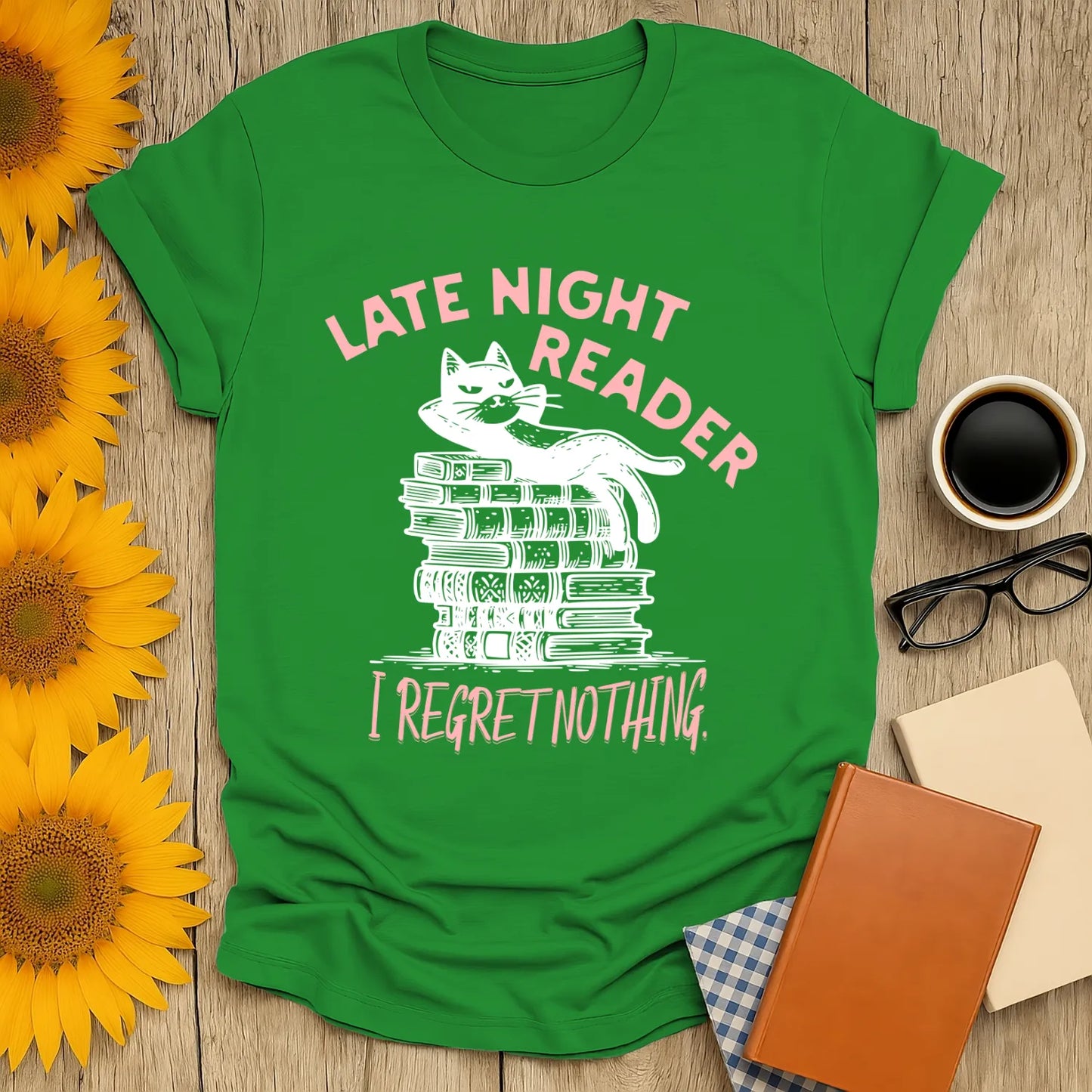 Late Night Reader T-Shirt featuring a relaxed cat on books with the text "I Regret Nothing," perfect for book lovers.