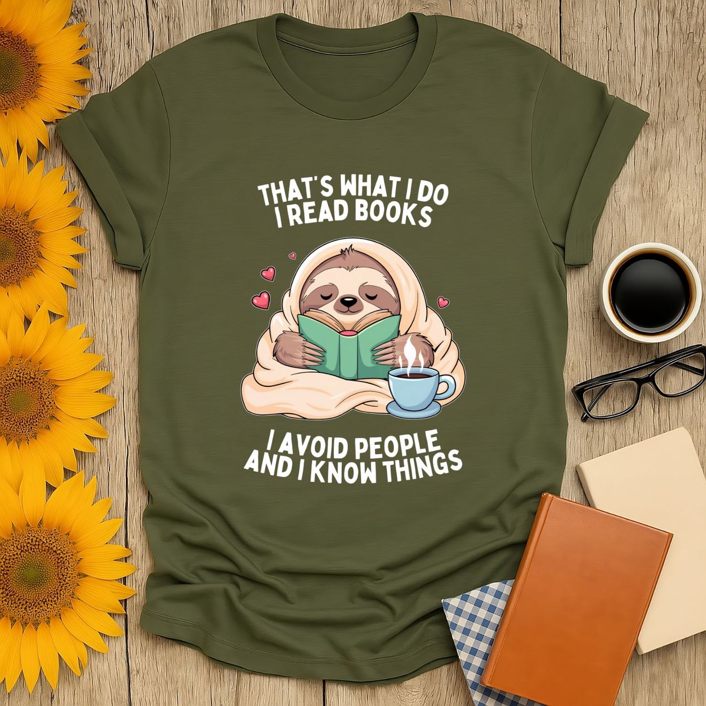 Sloth reading a book on a t-shirt with the phrase "I avoid people and I know things," perfect for book lovers.