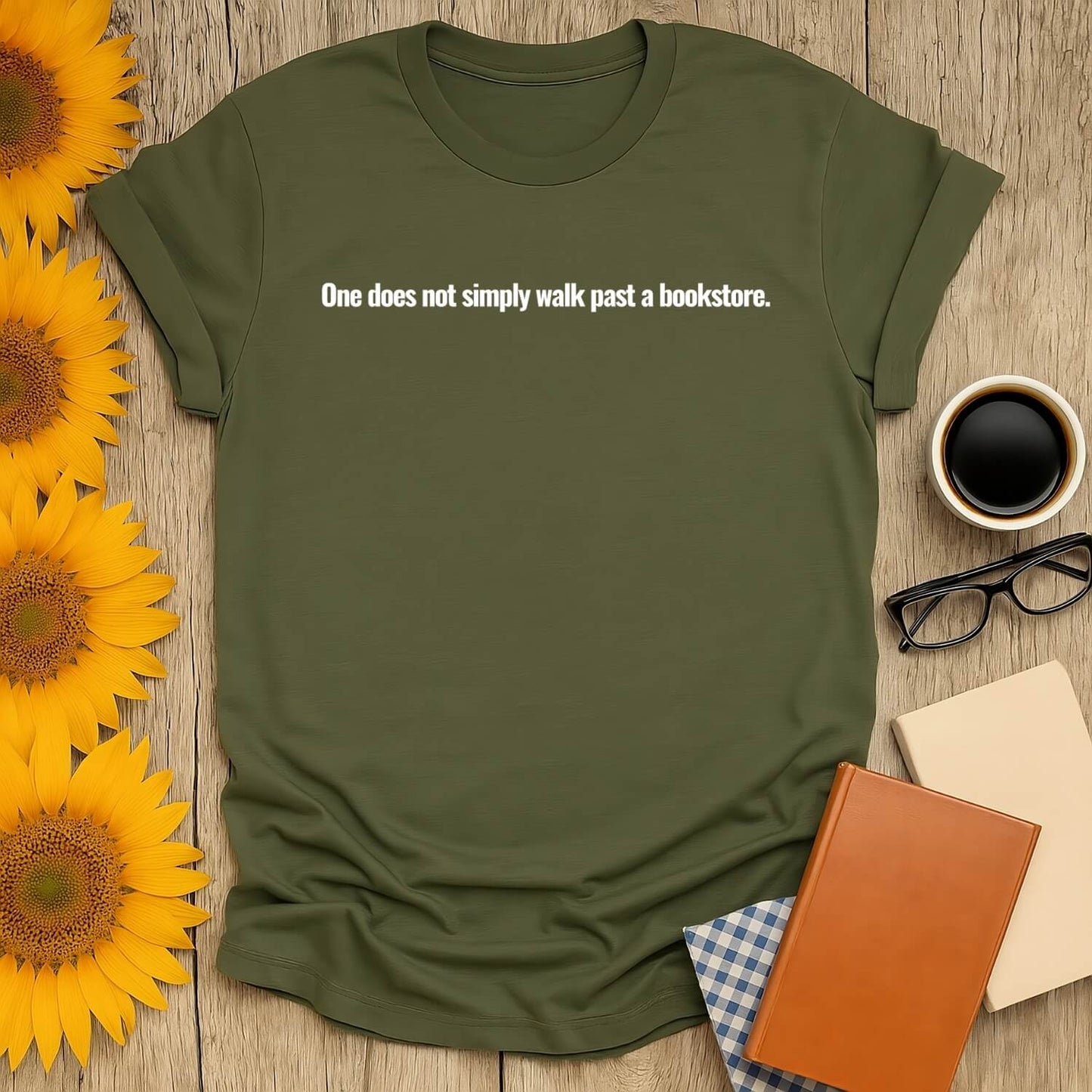 Bookstore Instinct T-Shirt in olive green with text: 'One does not simply walk past a bookstore.' Perfect for book lovers.