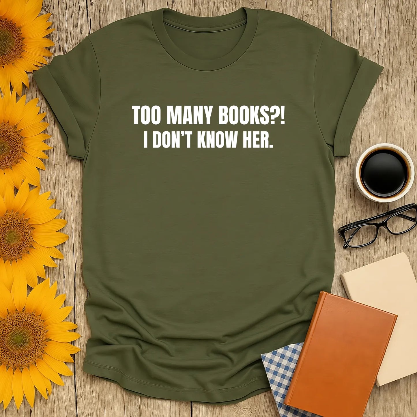 Funny book lover shirt with slogan 'Too Many Books?! I Don't Know Her.' Perfect gift for cozy reading enthusiasts.