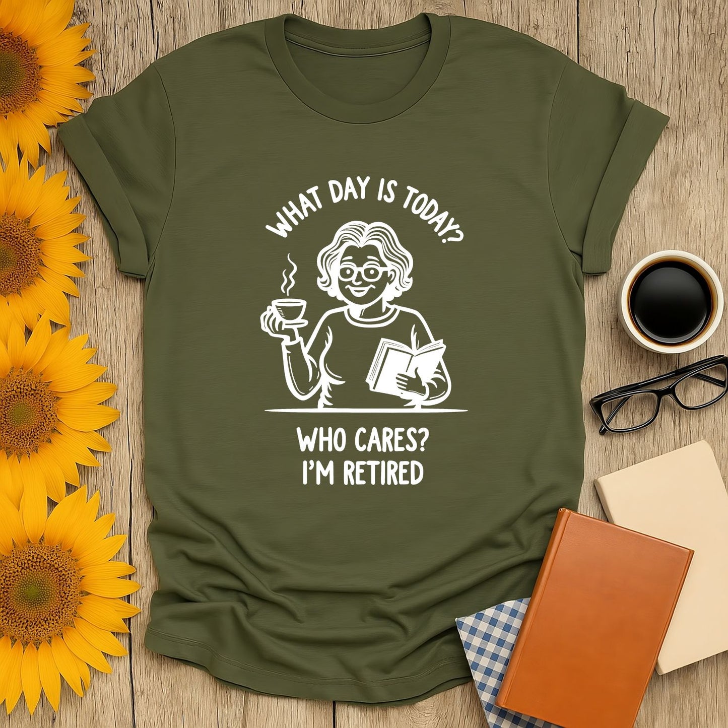 Green t-shirt with a humorous retirement design featuring a cartoon woman holding coffee and a book.
