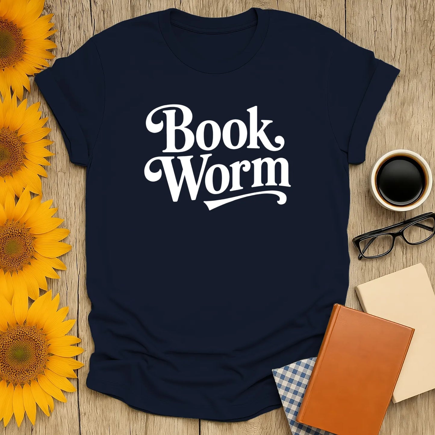 Cozy navy bookworm t-shirt with playful 'Book Worm' text, perfect for coffee and cat-loving readers.