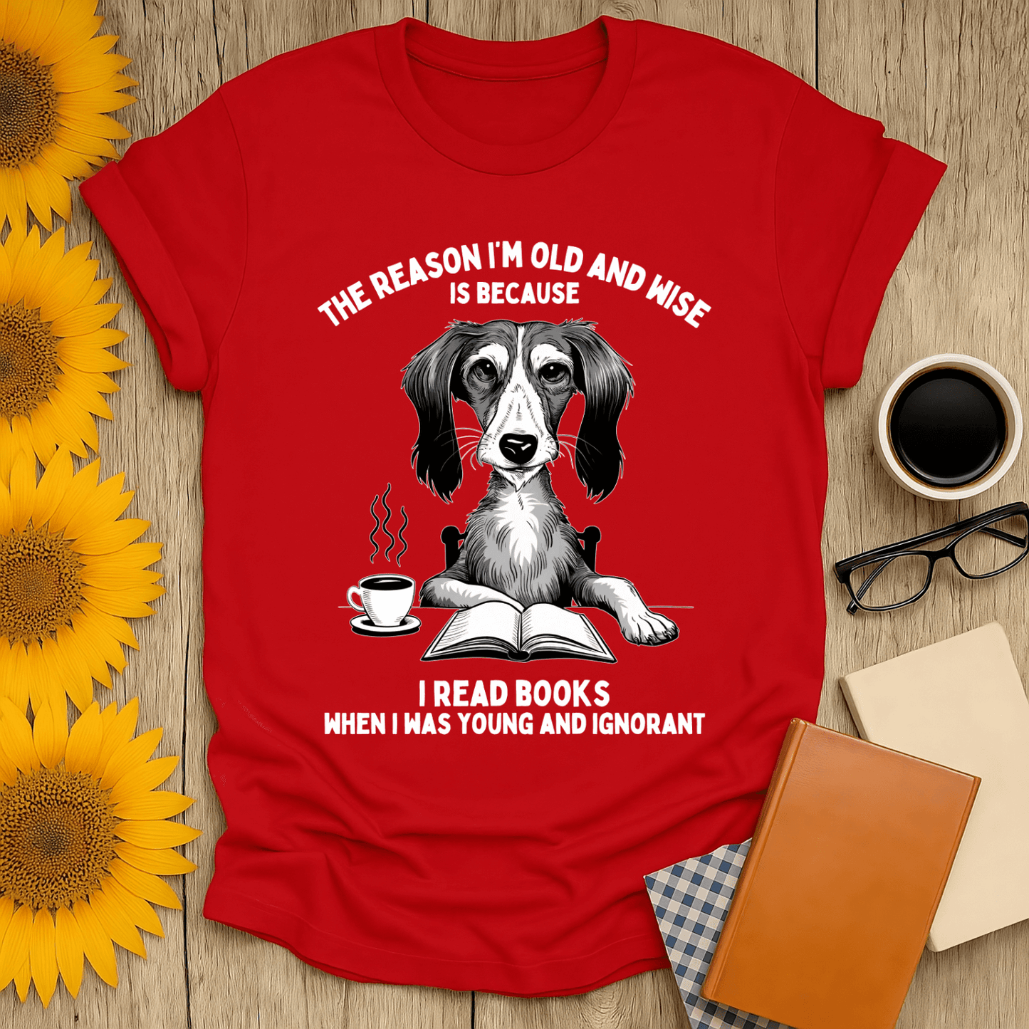 Old & Wise Reader T-Shirt featuring a dog with books, coffee, and humorous text for book lovers.