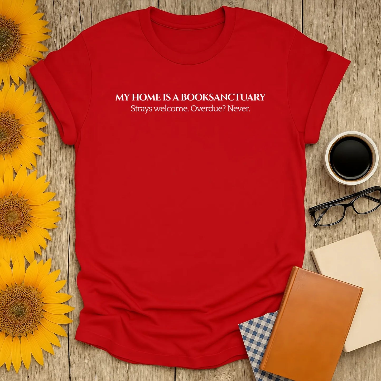 Red Book Sanctuary T-shirt with text: 'My Home is a Booksanctuary. Strays welcome. Overdue? Never.' Perfect gift for cozy readers.