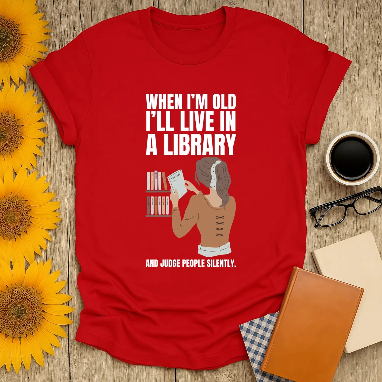 Funny red book lover shirt featuring a woman reading with the text: 'When I'm old I'll live in a library and judge people silently.'