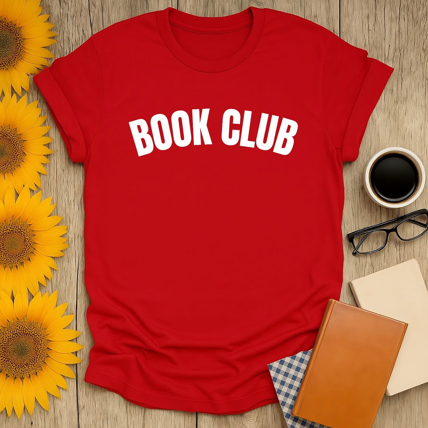 Bright red unisex t-shirt reading 'BOOK CLUB', perfect for book lovers who enjoy cozy reads with cats or coffee.