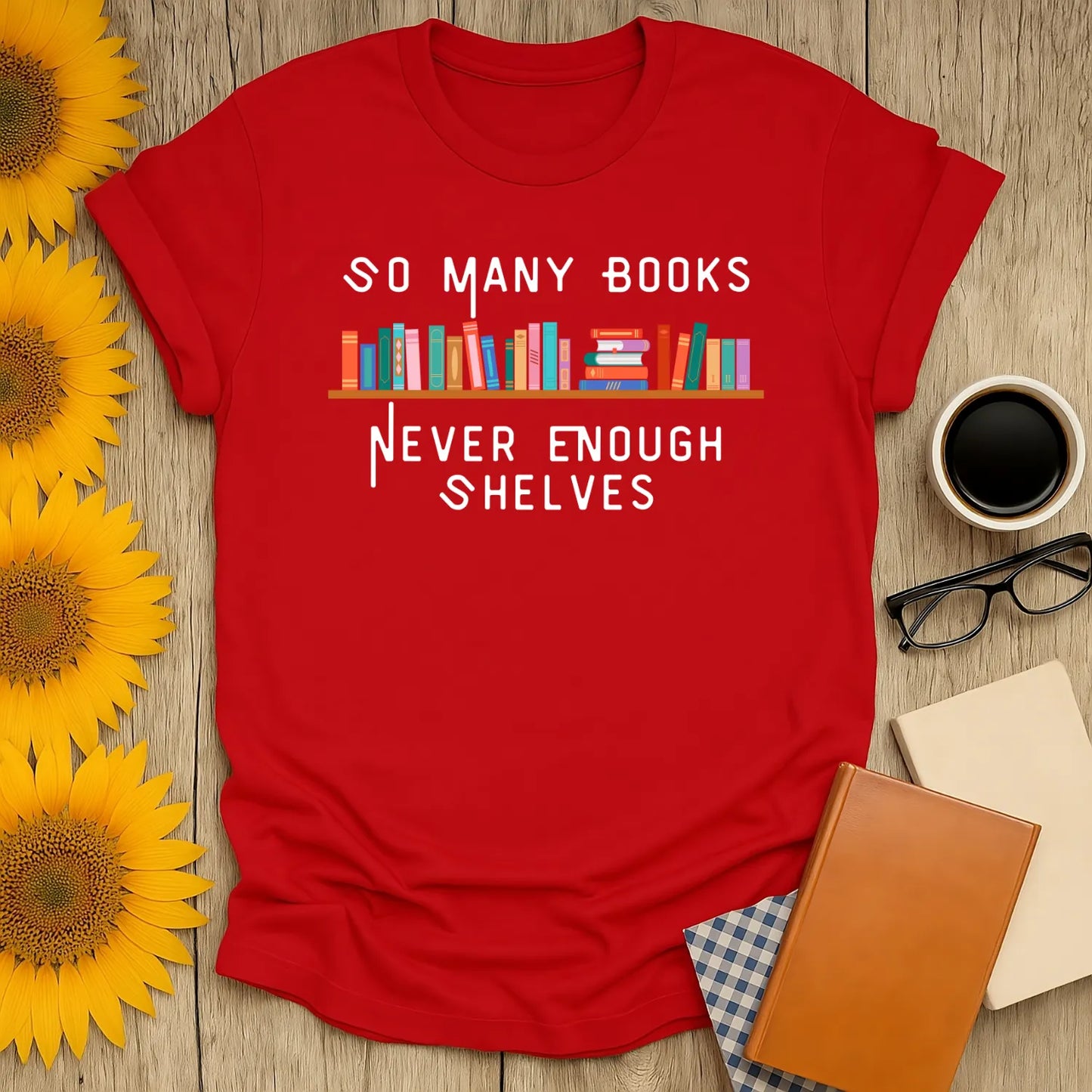 Funny reading tee with the text 'So Many Books Never Enough Shelves' and colorful book illustration, perfect gift for book lovers.