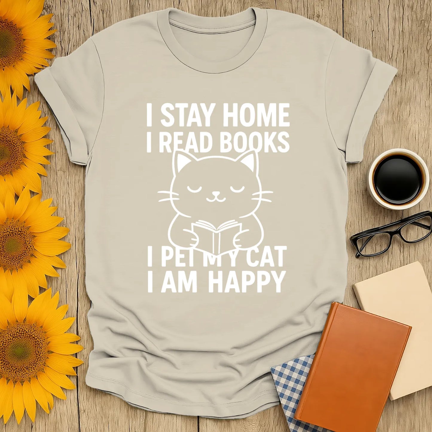 Cozy book lover shirt featuring a happy cat with text: 'I stay home, I read books, I pet my cat, I am happy.' Perfect gift for readers.