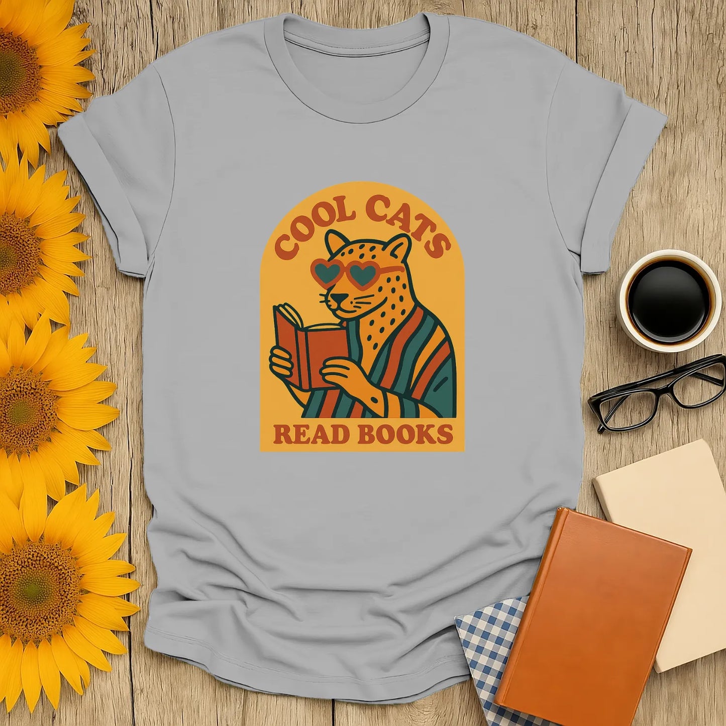 Cool Cats Read T-Shirt featuring a stylish cat in shades holding a book, perfect for book lovers and quirky gift ideas.