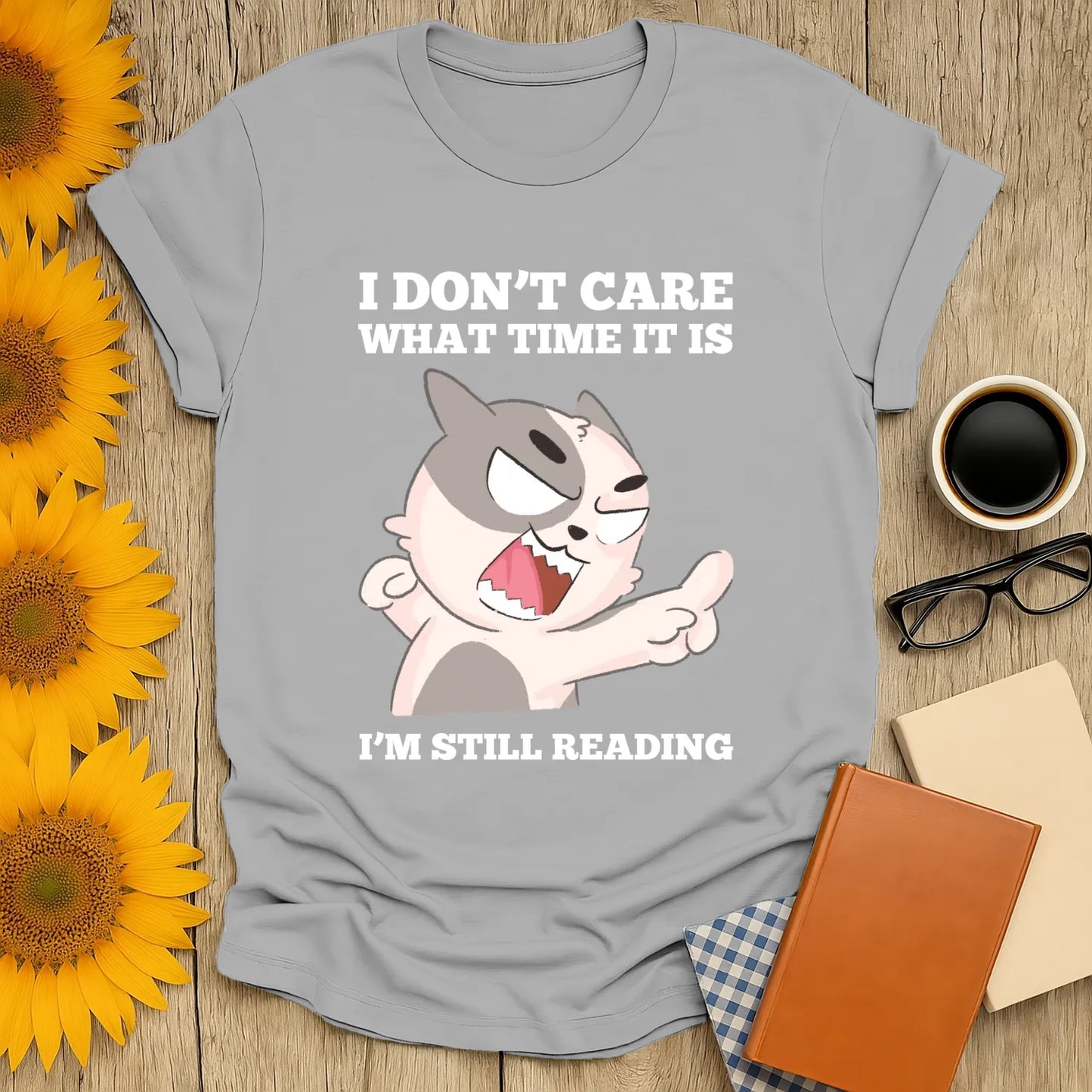 Funny cat reading shirt with a sassy cat saying 'I don't care what time it is, I’m still reading!' Perfect gift for book lovers.