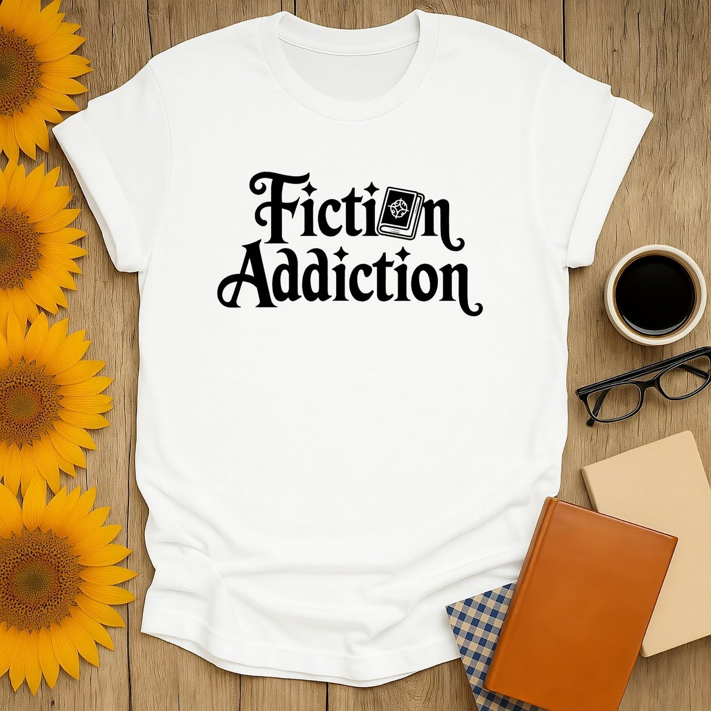 Fiction Addiction T-Shirt design featuring bold text and a book illustration, perfect for book lovers and cozy reading moments.