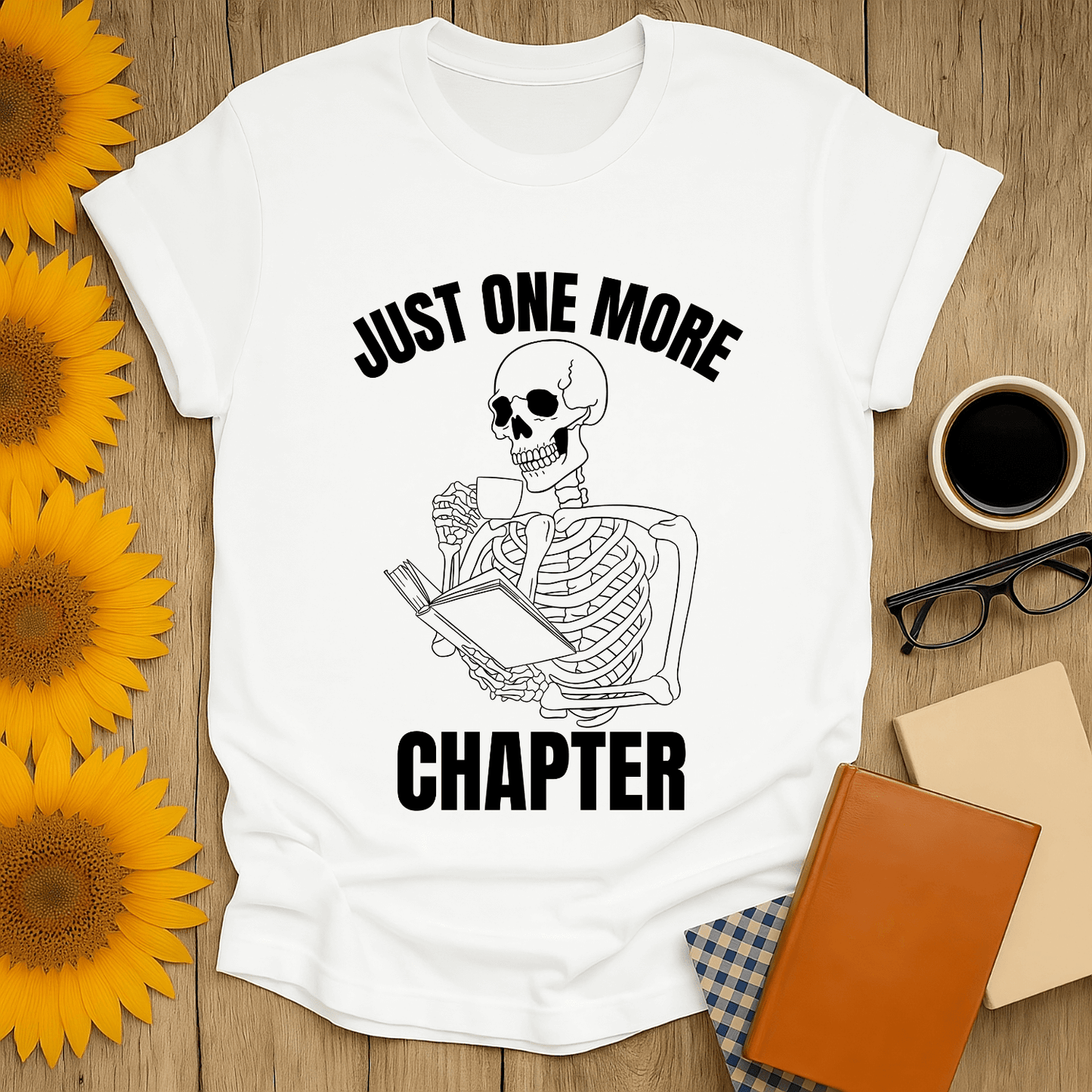 Skeleton Reader T-Shirt for book lovers with a fun design, perfect for casual wear and reading enthusiasts.