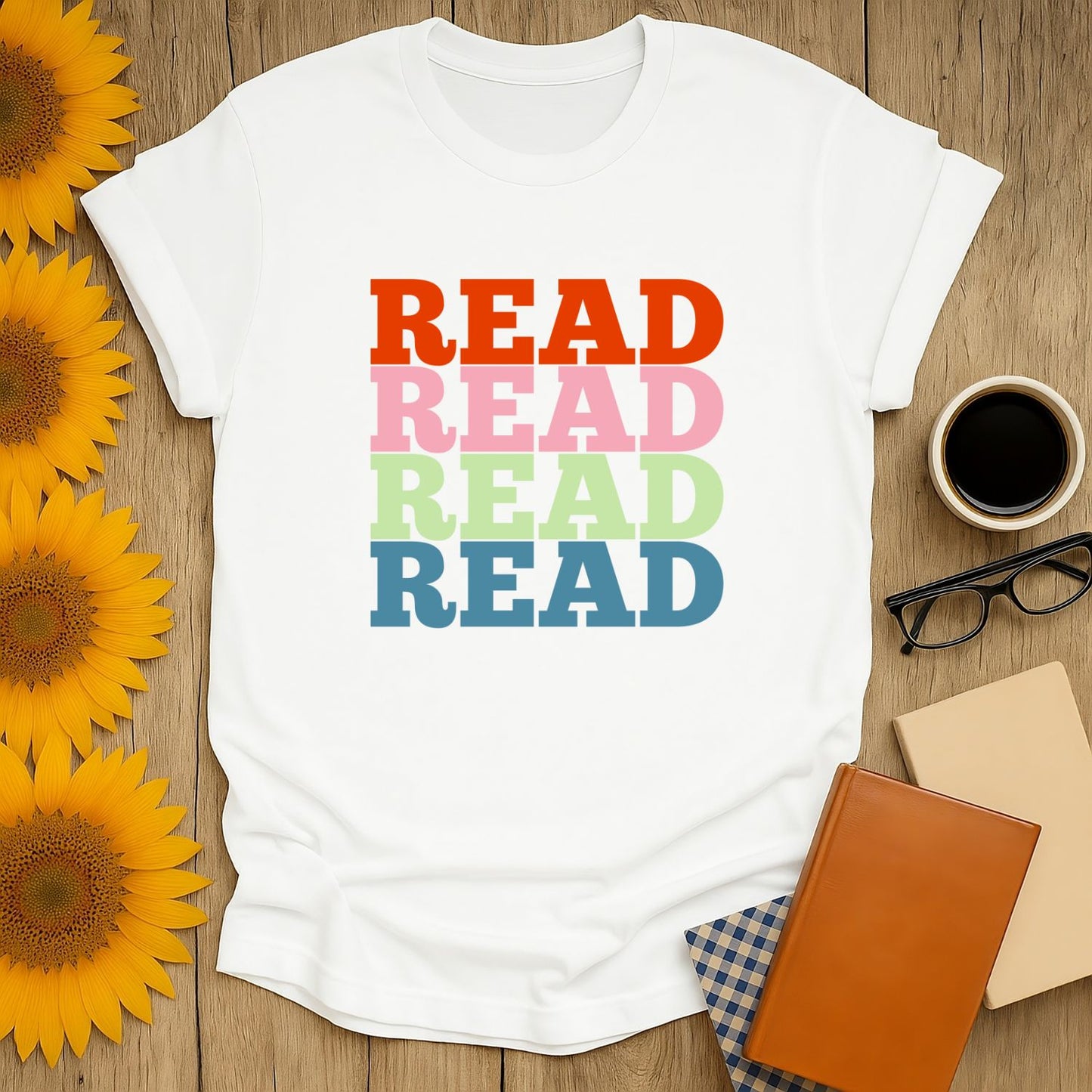 Funny reading tee with bold 'READ' text in colorful layers, perfect cozy book shirt for cat and coffee lovers.