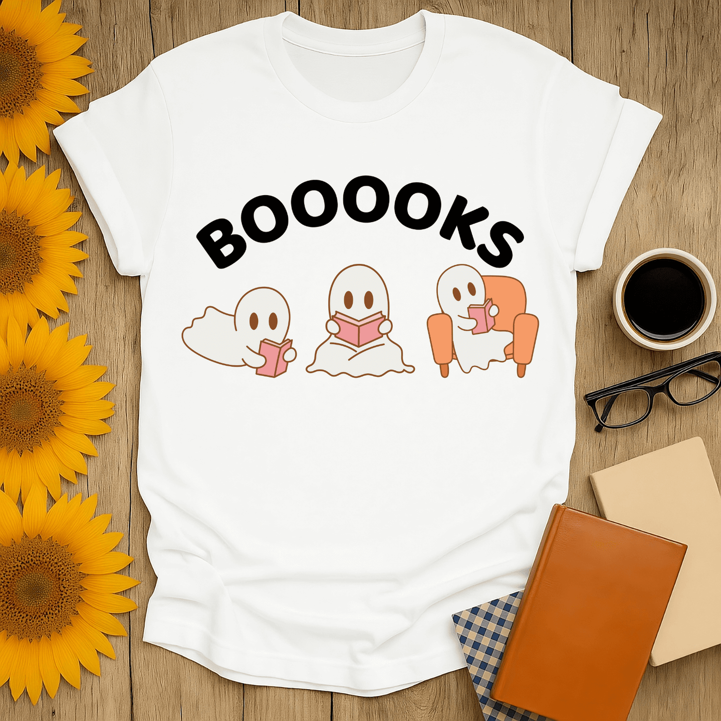 Booooks T-Shirt for book lovers featuring playful ghost designs, perfect for cozy reading vibes.
