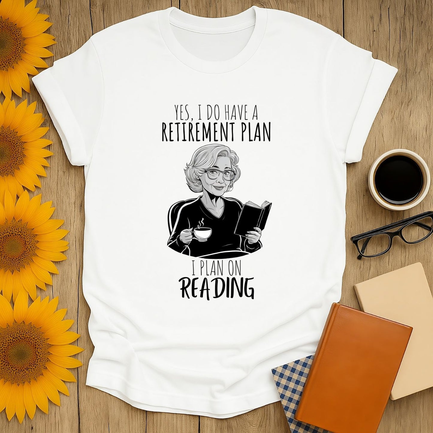 Funny Retirement Plan T-Shirt featuring a book lover with coffee, saying "I plan on reading"—perfect gift for cat and tea enthusiasts!
