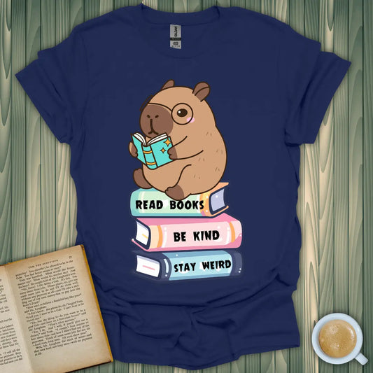 Capybara Reader T-Shirt for book lovers, featuring cute design with books and the text 'Read Books, Be Kind, Stay Weird'.