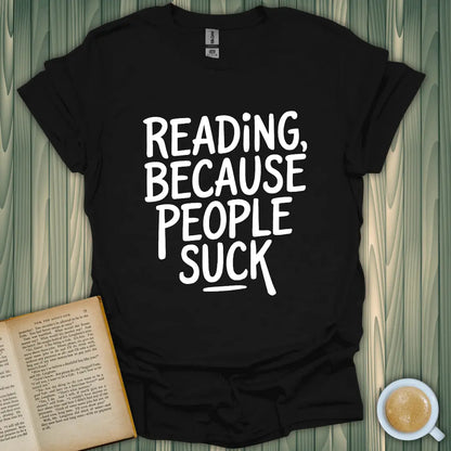 Unisex black t-shirt with "Reading, Because People Suck" design, perfect for book lovers and printed in the USA.