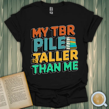 TBR Pile T-Shirt for book lovers, featuring a colorful design on a black unisex shirt.