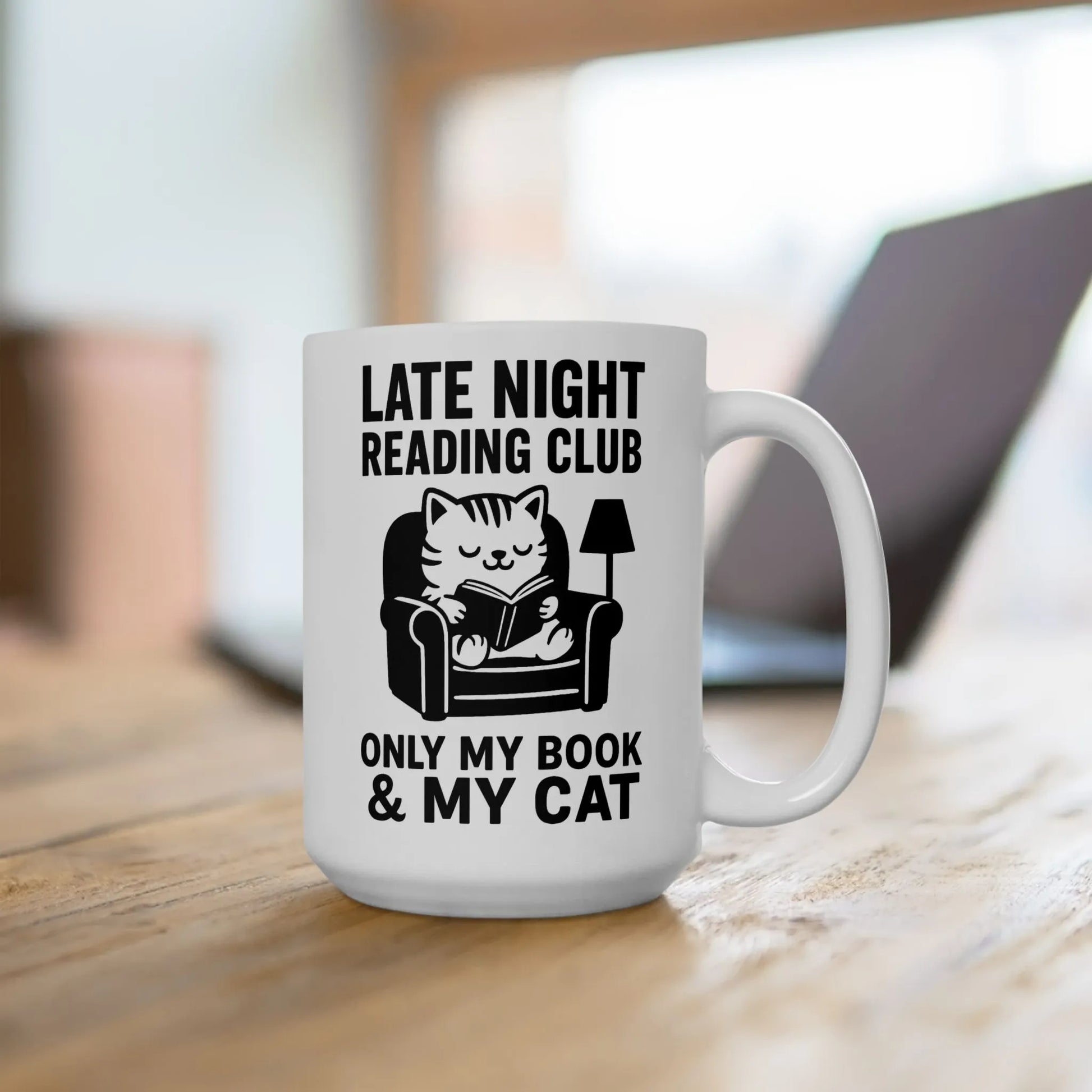 Late Night Reading Club Mug featuring a cozy cat illustration, perfect for book lovers who enjoy tea or coffee.