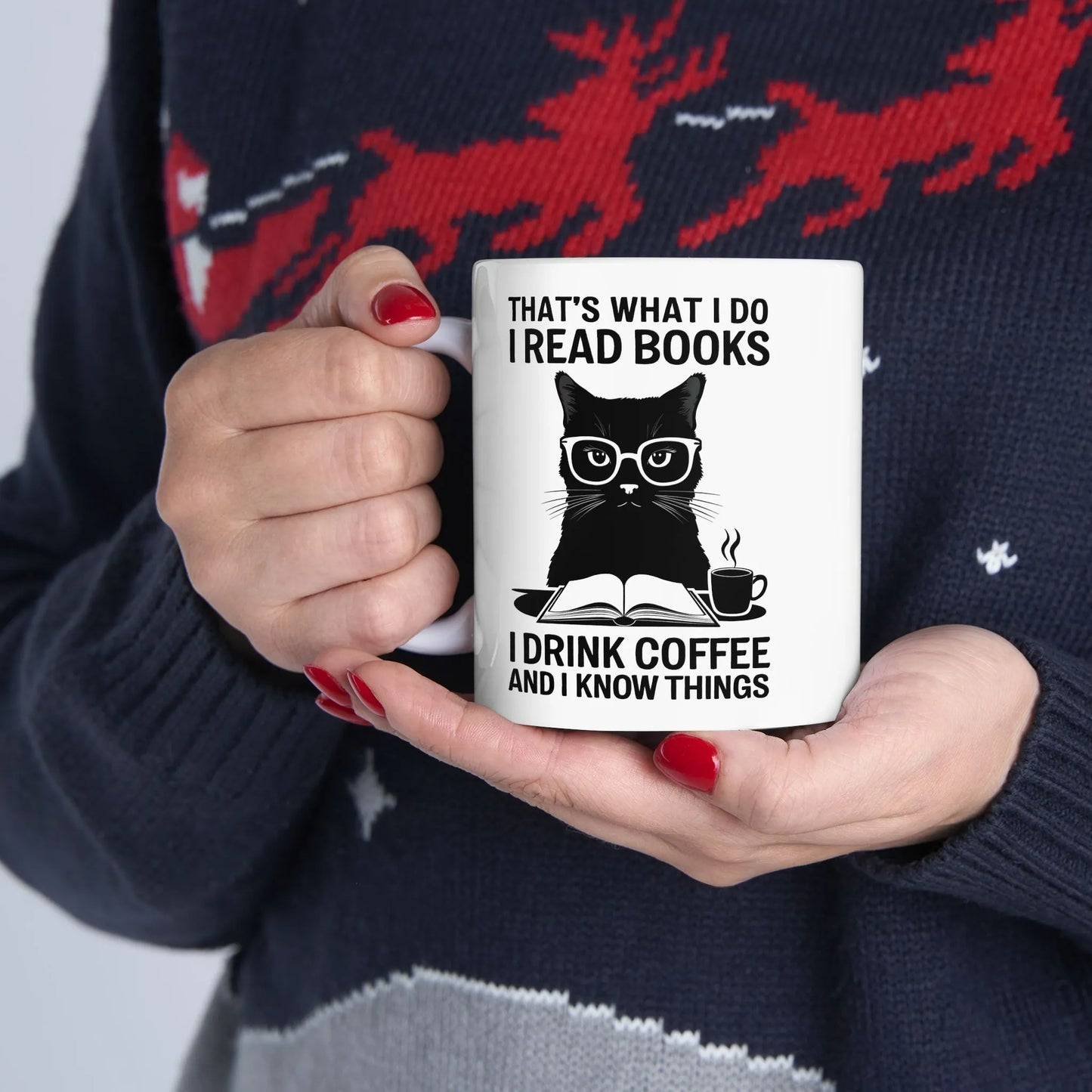 Coffee & Cat Wisdom Mug featuring a black cat with glasses and text about reading books and coffee, perfect gift for cat-loving readers.