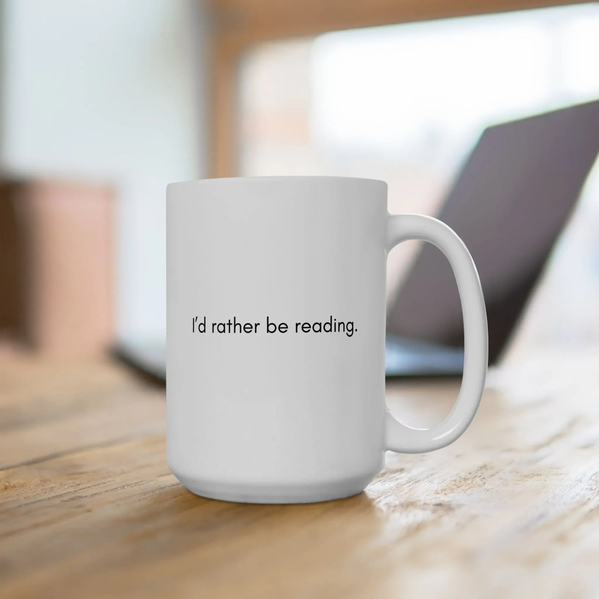 alt_tag: Rather Be Reading Mug with minimalist text saying 'I'd rather be reading,' perfect for cozy coffee breaks.