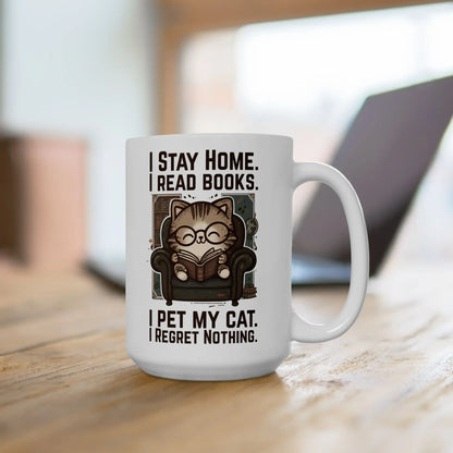 Library Cat Reader Mug featuring a cute cat in glasses reading books with the text: "I STAY HOME. I READ BOOKS. I PET MY CAT. I REGRET NOTHING."