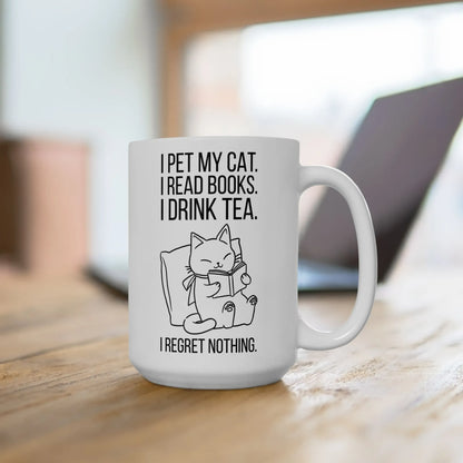 Purrfect Tea & Tales Mug featuring a cute cat reading with the text: I pet my cat. I read books. I drink tea. I regret nothing.