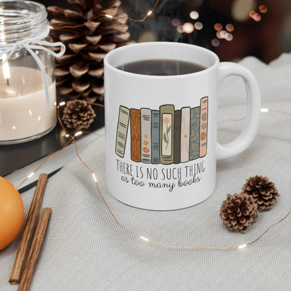 Too Many Books Mug featuring illustrated books and the phrase 'There is no such thing as too many books'.