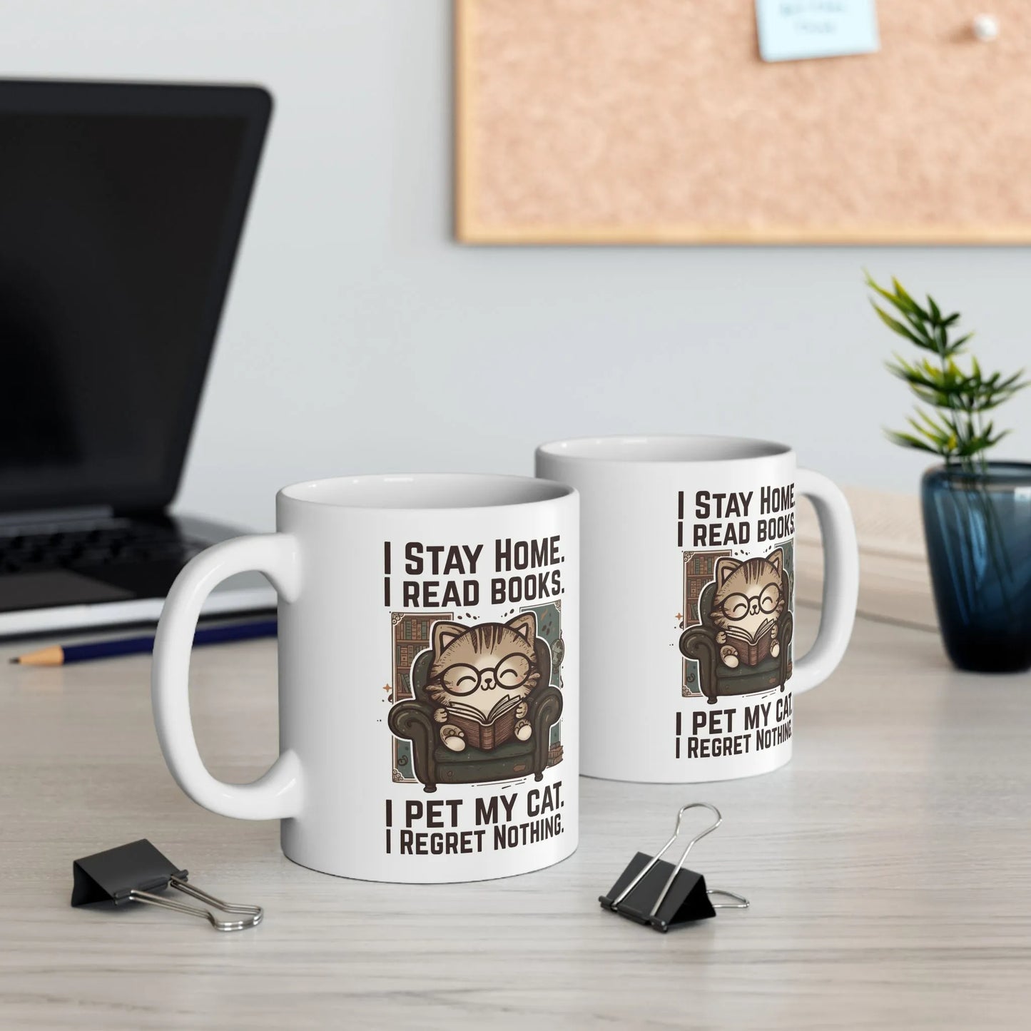 Library Cat Reader Mug featuring a cute cat reading, with text: "Stay Home. Read Books. I Pet My Cat. Regret Nothing." Perfect for book lovers.
