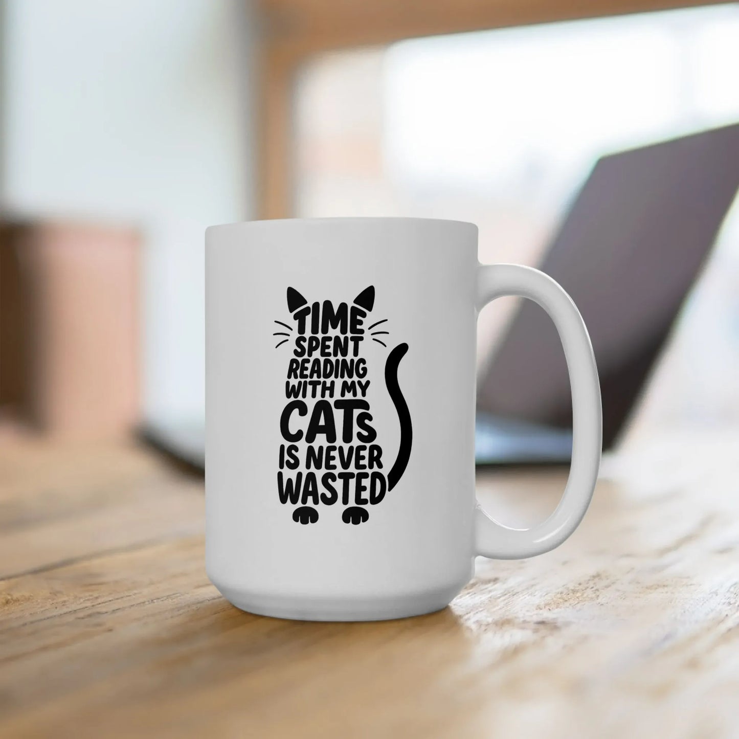 Never Wasted with Cats Mug featuring a cat-shaped quote, perfect for cozy reading moments with a feline friend.