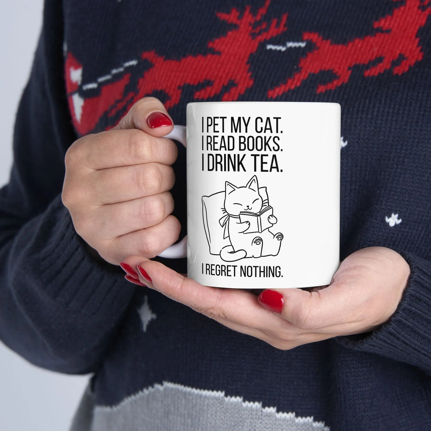 Purrfect Tea & Tales Mug with a reading kitty illustration and humorous text, perfect for cozy book lovers.