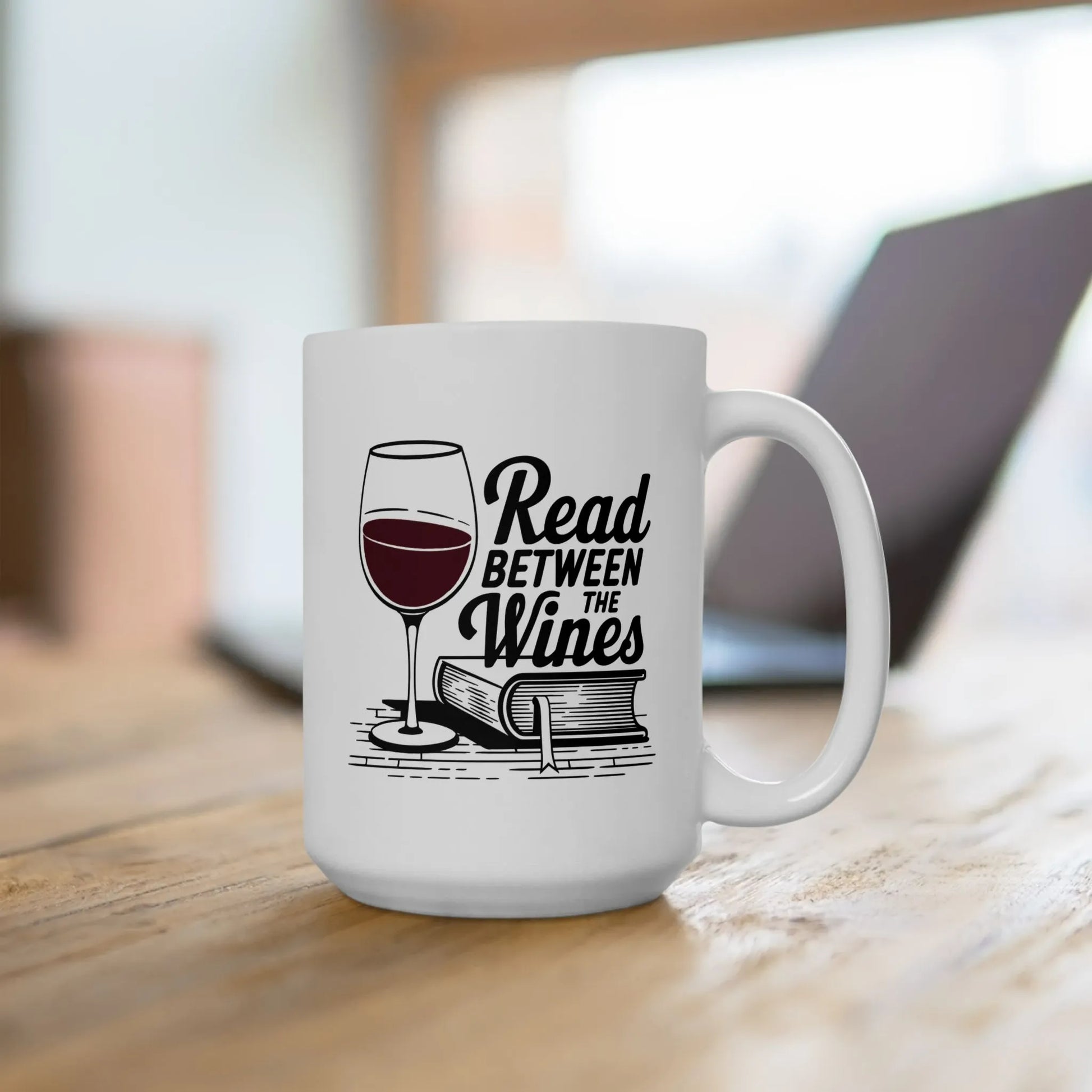 Read Between the Wines Mug featuring a wine glass and a book, perfect for book lovers and a cozy reading vibe.