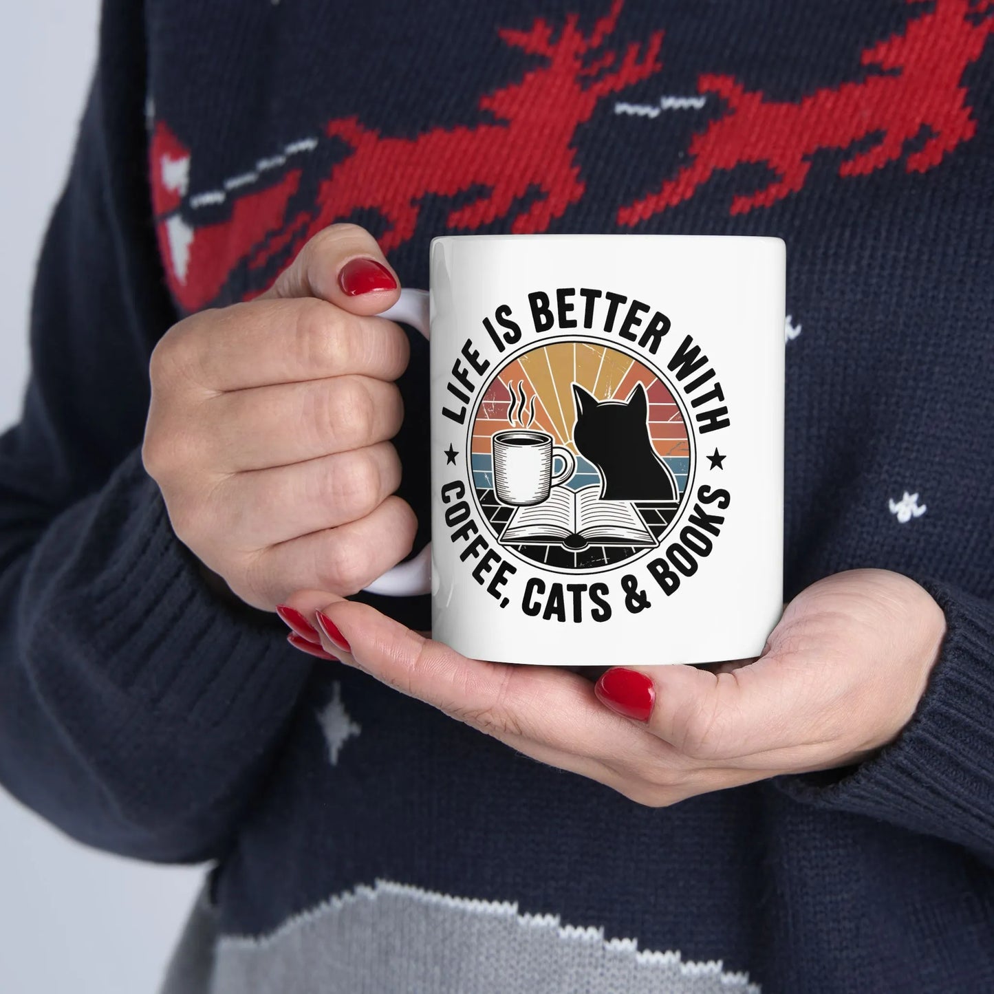 Sunset Reads & Whiskers Mug featuring a cat, coffee, and books, perfect for cozy reading moments and gifts for readers.
