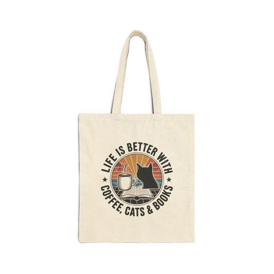 Sunset Reads & Whiskers Tote Bag featuring a cozy design with a cat, coffee, and books, perfect for book lovers.