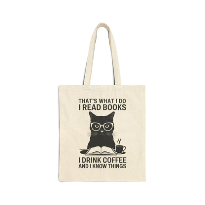 Coffee & Cat Wisdom Tote Bag featuring a witty cat illustration with glasses, reading a book and holding coffee, perfect for book lovers.