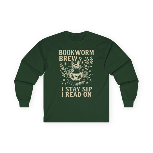 Whimsical cat in a cup on 'Bookworm Brew' shirt; reads 'I stay sip, I read on.' Perfect gift for book lovers and cat enthusiasts.