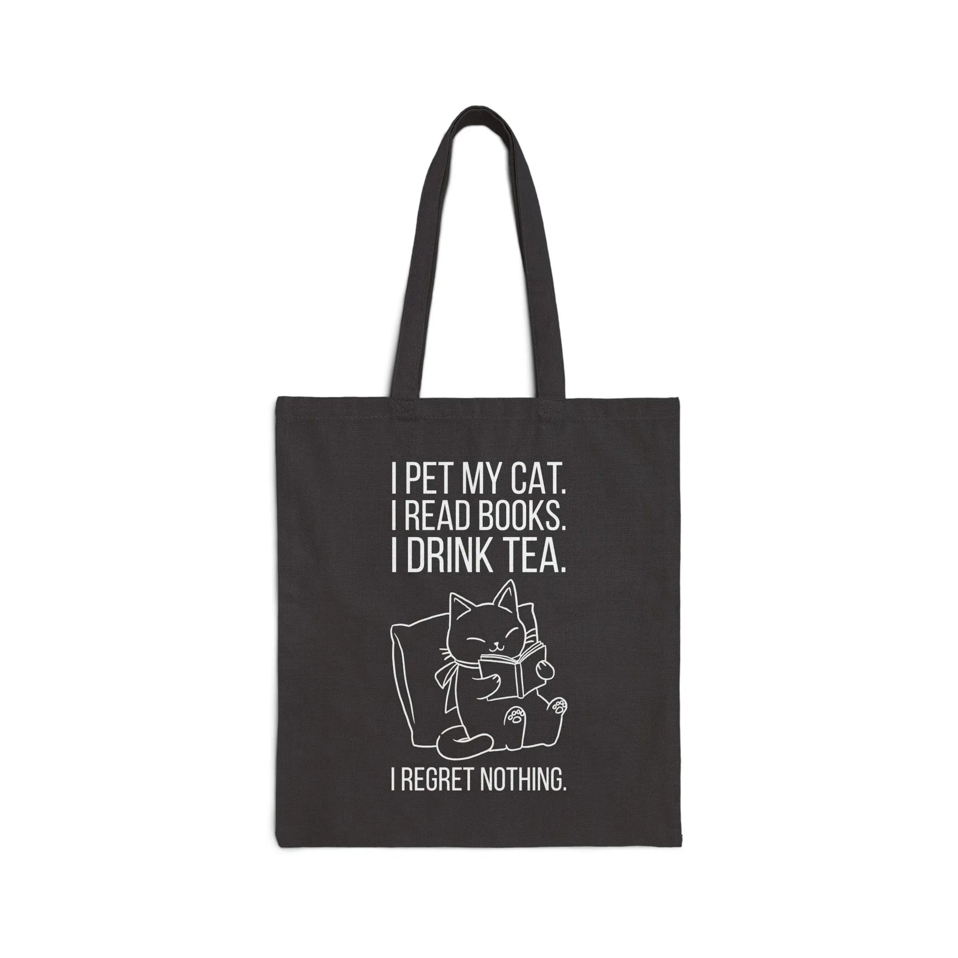 Purrfect Tea & Tales Tote Bag featuring a cozy cat with text: 'I pet my cat. I read books. I drink tea. I regret nothing.' Perfect for book lovers!