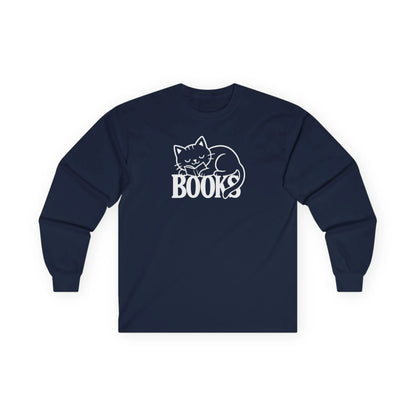 Cozy Catnap & Books Long Sleeve shirt featuring a sleeping cat illustration wrapped around the word 'BOOKS' - perfect for book lovers!