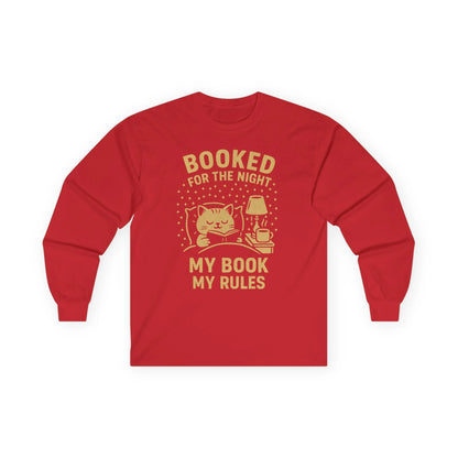 Red long sleeve shirt with a cat, book, and lamp design, saying 'Booked for the Night, My Book My Rules' for cozy book lovers.