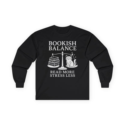 Bookish Balance Long Sleeve features a cat and books on a scale with text: 'Read More Stress Less'. Perfect gift for book lovers!