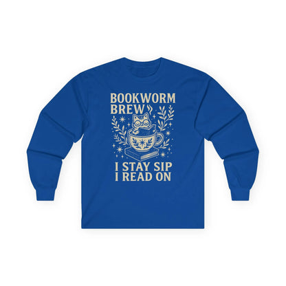 Cozy blue long sleeve shirt featuring a cat in a cup and the text 'I stay sip, I read on.' Perfect gift for book lovers!