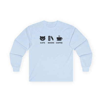 Holy Trinity Long Sleeve in light blue featuring playful graphics of cats, books, and coffee, ideal for cozy reading.