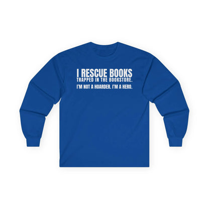 Cozy blue long sleeve tee that reads 'I Rescue Books. I'm not a hoarder. I'm a hero.' Perfect gift for book lovers!